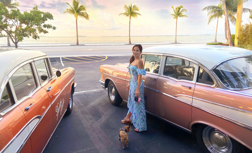 Woman with chihuahua dog at pet friendly hotel in key west florida.